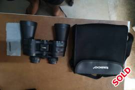 Tasco Binocular, Tasco Binoculars

Tasco 10x50 ZIP Focus

Tasco 10x25

Both comes with their covers and lens cloths
