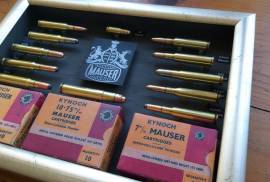 MAUSER DISPLAY COLLECTION, Mancave art at its best. Mauser cartridge collection.  Completes your Mauser rifle collection.  All deactivated cartridges, no permit required R1250. Trevor 