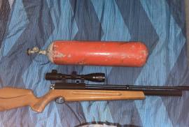 PCP Air rifle, PCP air rifle with 200 bar diving cylinder. Scope and two magazines 