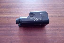 Surefire XC1 Weaponlight, Surefire XC1 Weaponlight.
Unsurpased Surefire quality. 
Fits flush with the front of the slide of G19 sized handguns. 
New price is in the region of R10K. 
The item is in good condition. 100% functional. Uses one AAA battery.