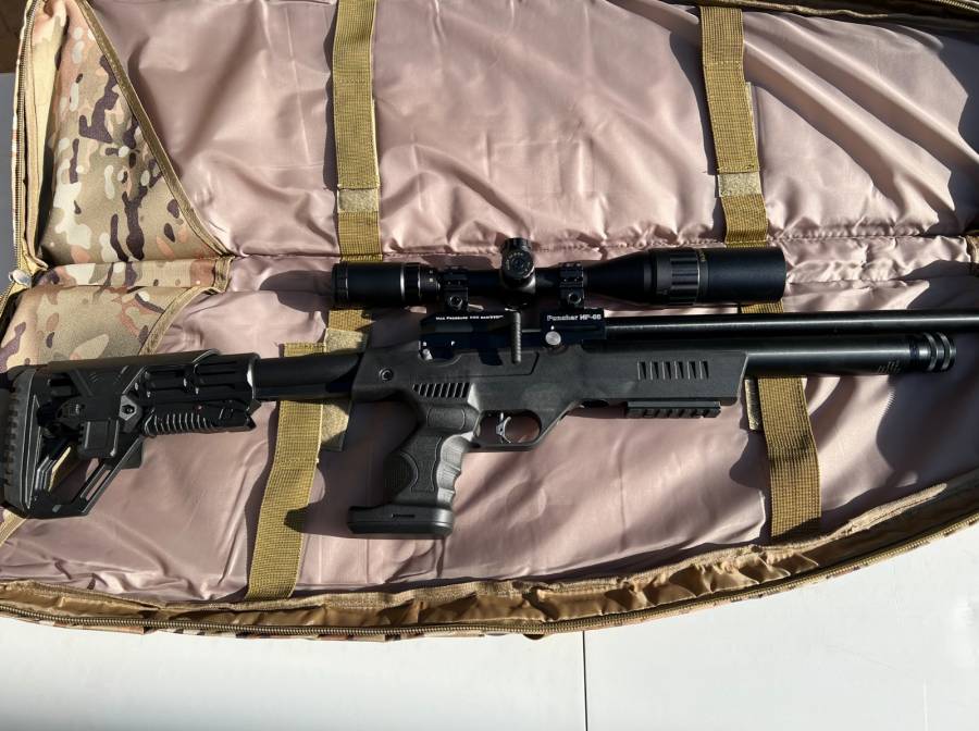 KRAL ARMS Puncher NP-05 , Awesome PCP with adjustable stock. Price includes a 4-16X44 Scope, as well as a camo rifle bag (as seen in pictures). Two 12 shot magazines are also included. The gun is in extremely good condition and has only fired about 50 shots. 