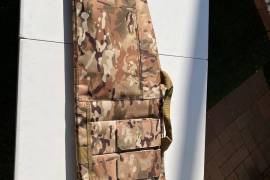 KRAL ARMS Puncher NP-05 , Awesome PCP with adjustable stock. Price includes a 4-16X44 Scope, as well as a camo rifle bag (as seen in pictures). Two 12 shot magazines are also included. The gun is in extremely good condition and has only fired about 50 shots. 