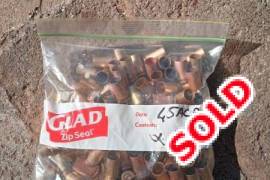 Used 45acp brass for sale, 98 used 45acp cases, various head stamps. R245.00