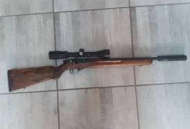 Mauser. 22lr, Very good condition. 
Silencer with end cap. 
Scope included. 
1x 5 round magazine 