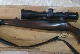 Sauer and Sohn 202 Elegance .300 win mag, Sauer and Sohn 202 Elegance .300 Win Mag, Schultz and Larsen silencer. Very good condition (minor scratches). Less than 100 shots. Scope NOT and included.