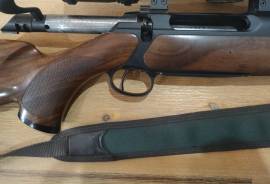 Sauer and Sohn 202 Elegance .300 win mag, Sauer and Sohn 202 Elegance .300 Win Mag, Schultz and Larsen silencer. Very good condition (minor scratches). Less than 100 shots. Scope NOT and included.