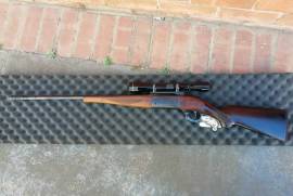 SAVAGE 250 LEVER ACTION WITH LEUPOLD SCOPE, SAVAGE 250 LEVER ACTION RIFLE IN ABSOLUTE MINT CONDITION WITH LEUPOLD SCOPE, DEALER STOCKED, DEALER TO DEALER TRANSFERS CAN BE ARRANGED AT PURCHASERS COST. Great Rifle at a give away price. 