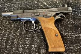 CZ 75- Pre B in new condition, In amazing condition, has only been used at rang once or twice
Comes with orginal grips,
Wood grips
and 3 magazines