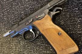 CZ 75- Pre B in new condition, In amazing condition, has only been used at rang once or twice
Comes with orginal grips,
Wood grips
and 3 magazines