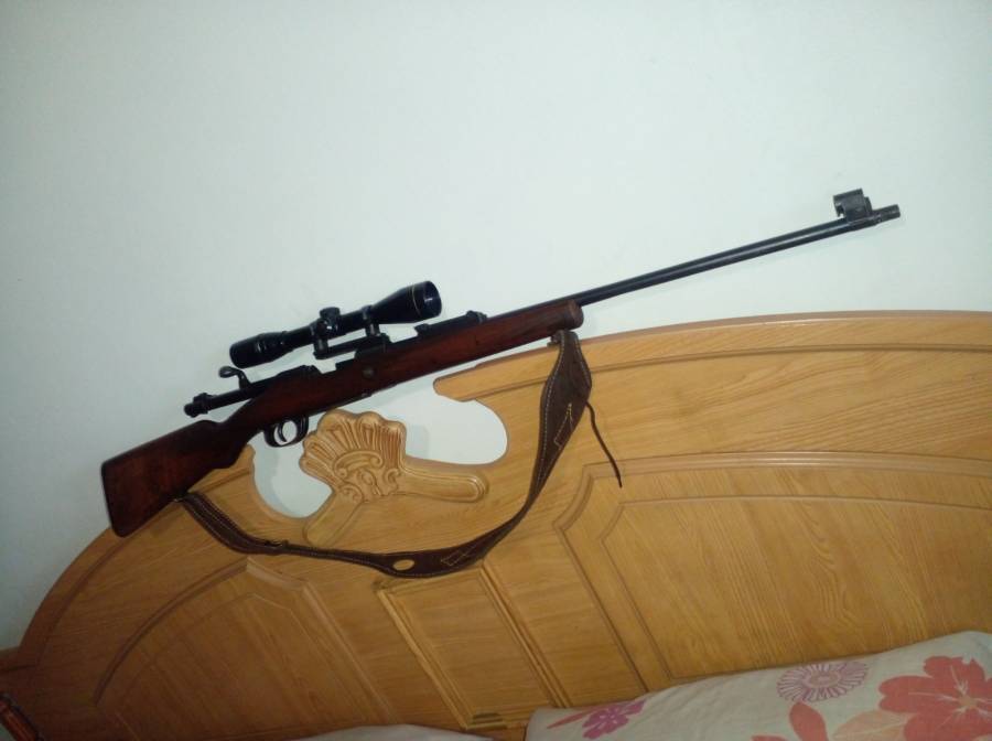 8mm Mauser, I am selling this rifle with package it comes with a scope ...