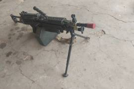 Saw machine gun, I have a airsoft saw wich i want to sell it just need a new battery