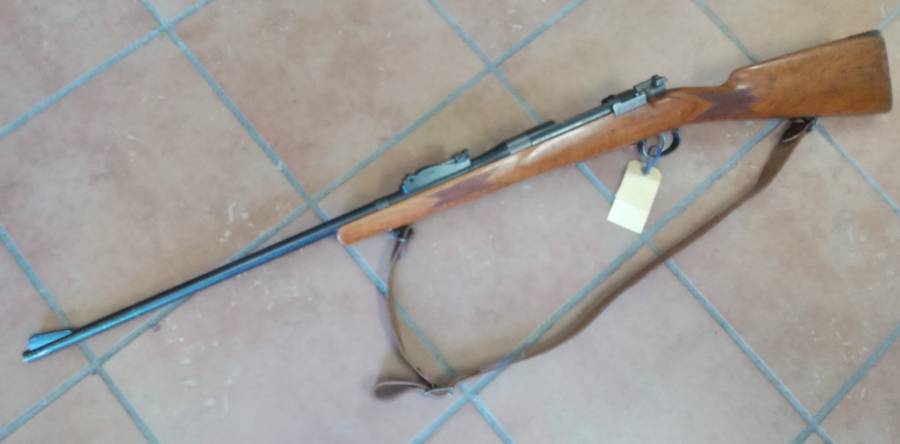 for sale, This is a modified Mauser model 1893 rifle that was originally chambered in 7x57 Mauser. It appears to have been retrofitted with a barrel from a P14 rifle and is now chambered in .303 British. Action , wood and barrel all in very good condition.