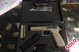 CZ PO9 9MM FDE, CZ P09 9mm FDE. Only shot 200 round.i took very good care of this pistol. The pistol is currently at standerton gun shop (Pro sport) they are selling the  pistol for me with no extra cost. this cz in FDE is very rare.it comes with everything i got it with.