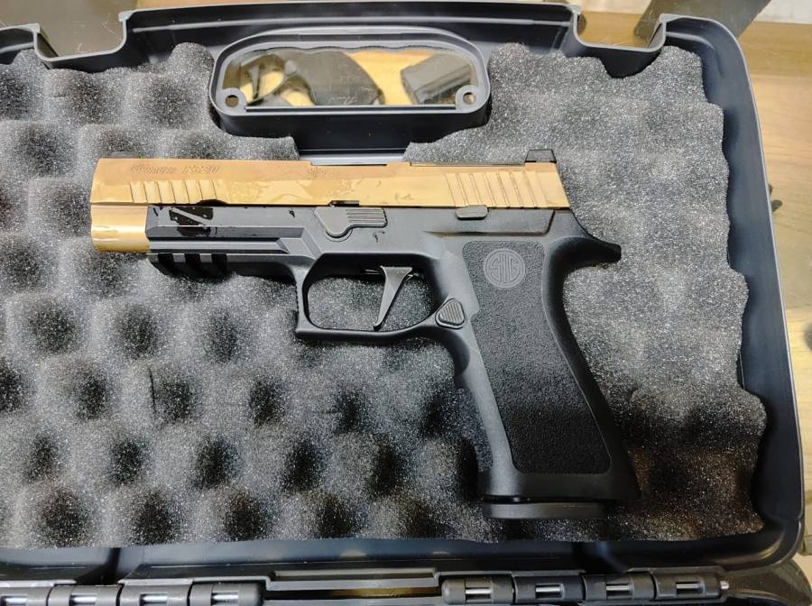 New Sig P320 V-tac for sale, 50 rounds fired at the range.  Purchased from shop but not yet registered and still at shop. Has green night sights and a V-tec trigger. 2 Tone.