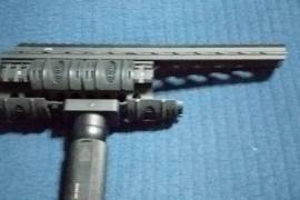 UTG Quad Tail for Galil, Quad Tactical rail and front grip for a Galil rifle.
Has 4 Picatiny rails to fit many accessories. 