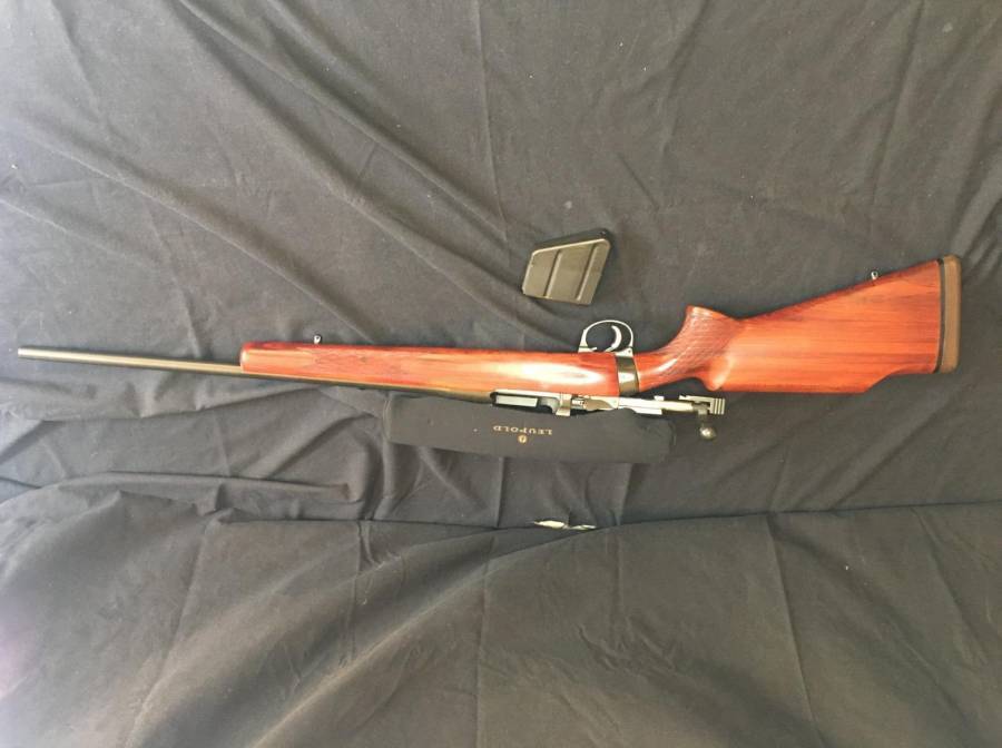 Custom Build Lee Enfield 303 No 4Mk3, Custom build Lee Enfield 303 with African Rosewood stock.

Includes Leupold 3-9 x 4mm Scope. Many loaded 180gr ammunition, +- 40 150gr bullets. Sholder sling, cleaning rod and boresnake.
 