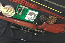 Custom Build Lee Enfield 303 No 4Mk3, Custom build Lee Enfield 303 with African Rosewood stock.

Includes Leupold 3-9 x 4mm Scope. Many loaded 180gr ammunition, +- 40 150gr bullets. Sholder sling, cleaning rod and boresnake.
 